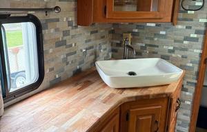 Beautifully maintained with rare kitchen island