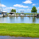 Marina view with docked boats and park shoreline visible — useful for showing the park’s boat/marina facilities (image hosted on the property site homepage).