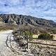 Gravel road leading to the Frijole Ranch area.  Guadalupe Mountains are visible in the background. 
