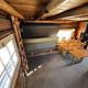 Folding Bunk beds inside of a log cabin
