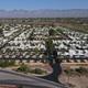 Aerial overview showing the full RV community layout, streets, entrances and surrounding landscape — useful as the primary site overview (matches page aerial images).