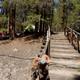 Wooden steps and lakeside/ waterfront campsite with tent and campground features (picnic gear visible) — useful scenic campsite view found on the site’s photos/background images for the property.