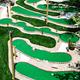 Aerial/overhead view of the mini-golf course on manicured grounds — shows a distinct on-site recreational feature referenced by the site (Mini-Golf context).