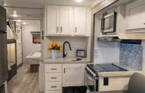 C06 - 10 Person w/ Bunk- The RV Rental Factory