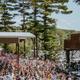 Shows the main outdoor concert amphitheater and large audience on the Indian Ranch grounds; matches homepage concert imagery and page context indicating live-music venue on property.