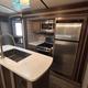 #24_Trailer w/ king, bed 4 bunks & outside kitchen