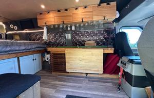 Custom van build out: Unique wrap; diesel heater