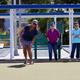 Bocce court in use with players and courts visible — shows on-site recreation facilities from the community section.