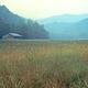 Dawn breaks over an historic cabin in Cataloochee Valley