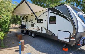 30' GrandDesign. Great for a family of four.