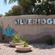 Property entrance sign with ‘SILVERIDGE’ name, desert landscaping and address number — useful as an identifying gateway photo for the resort (from homepage slider image).
