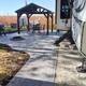 Deluxe patio/site with pergola, firepit and RV slide-out visible — shows an example of premium RV/patio sites referenced on the property page.