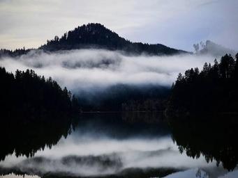 A view of Loon Lake with fog settling in above the lake