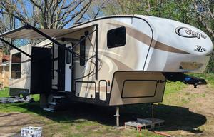 Dino's Keystone Cougar 28 ft. 5th Wheel
