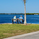 Waterfront view with bench and bay visible — demonstrates the park’s bayfront scenery and setting (gallery image ‘bench-on-canal’ on the property site).