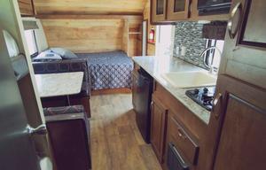 Meet Judy, retro themed camper w/ bunks to sleep 5