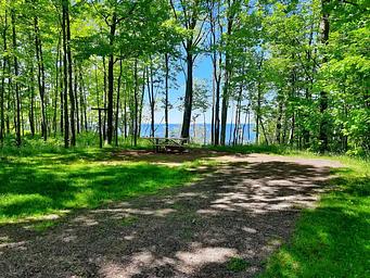 Black River Harbor Campground campsite with view of Lake Superior.