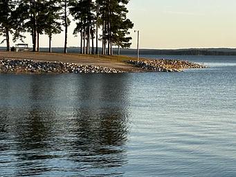A photo of one of multiple RAYBURN Park Boat Launches from across the water.