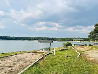 A photo of facility BUNCOMBE CREEK with Picnic Table, Electricity Hookup, Fire Pit, Waterfront, Water Hookup