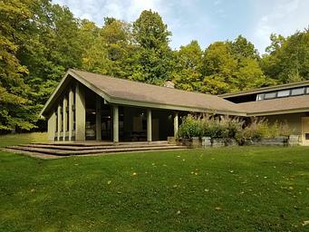 View of the outside of the Clark Lake pavilion and covered area.