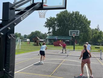 Pickleball and shuffleboard courts at Riverside Camping & RV Resort