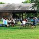 Picknickers at Fort Hunt on the lawn in front of the shelter