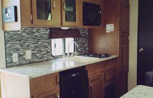 Meet Judy, retro themed camper w/ bunks to sleep 5
