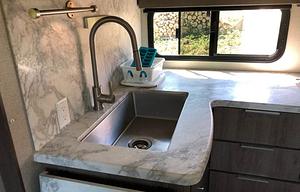 Fun AND Games in a comfy towable land yacht!