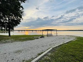 A photo of facility JUNIPER POINT with Picnic Table, Electricity Hookup, Fire Pit, Waterfront, Water Hookup