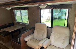 Camper with a queen living space and a bunkhouse.