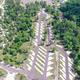 Aerial view focused on the RV pad rows and surrounding trees — useful detailed overview of site arrangement and vegetation; sourced from the site's gallery images.
