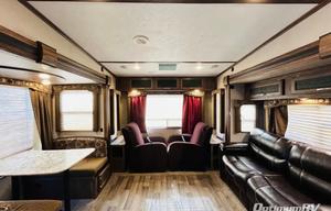 Dino's Keystone Cougar 28 ft. 5th Wheel