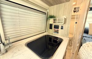 Self‑Contained Travato 59G — Sleeps 2, Seats 4