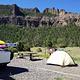 Rex Hale Campground campsite area with cliffs in background