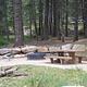 Aspen Group Campground picnic area with fire pit. 