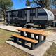 RV site and picnic table at Holiday RV Park in Florida.