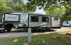 2019 Arctic Wolf 38' Bunkhouse 5th Wheel- sleeps 8