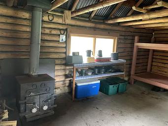 Inside Twogood Cabin cooking area and wood stove