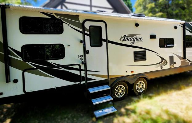 30' GrandDesign. Great for a family of four.
