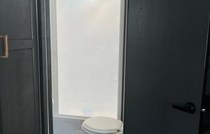 The Farmhouse travel trailer.