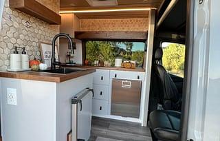 The Elite Explorer: Custom Luxury 4x4 Sprinter Van