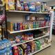 A convenience store shelf stocked with snacks and drinks at Trailin RV Park.