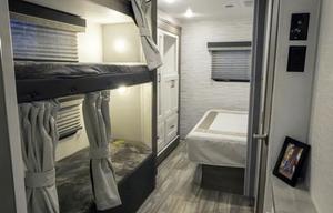 C06 - 10 Person w/ Bunk- The RV Rental Factory