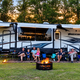 Picture of the Parks' sitting outside their camper