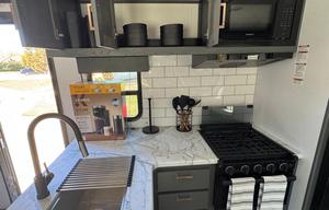 The Farmhouse travel trailer.