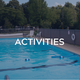 Photo of the on-site swimming pool with fencing and lounge chairs — shows a key campground facility and appears on the site’s Activities section.