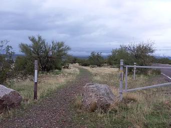 Grapevine trailhead between two large rocks