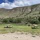 Dog Canyon RV campsite, mountains in the background and a picnic table for campers