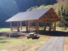 Large flat field, picnic shelter.  