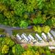 Lower-altitude aerial showing a row of RV pitches and parking areas among trees — useful close-up of RV site configuration; appears on the Green Mountain Park page.